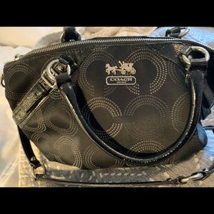 Coach bag with beautiful blue lining.